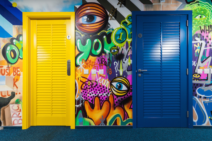 El arte del graffiti fomenta el diseño lúdico de la oficina. Imagen cortesía de nic media. 